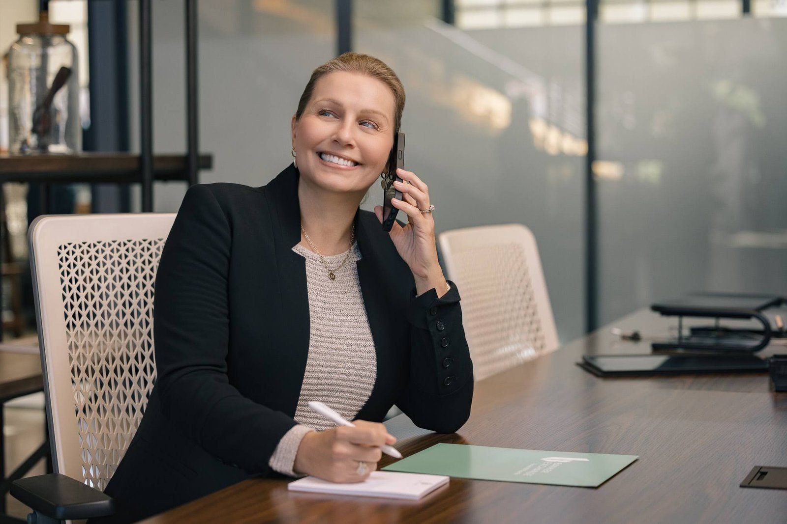 female-executive-phone-call-office-environment-jack-robert.jpg