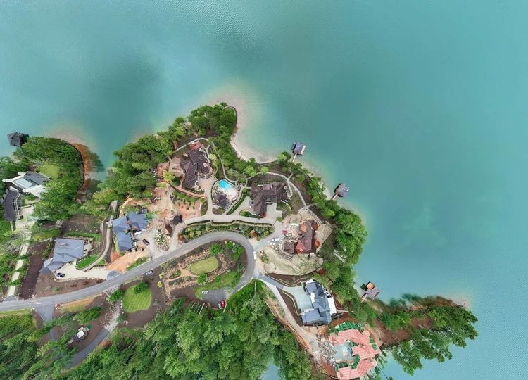 Aerial view of the Masterpiece on the Lake, featuring a lakefront estate.