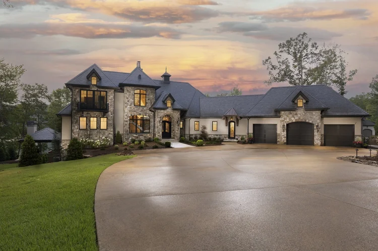 Twilight exterior of a custom home, built by Gabriel Builders.