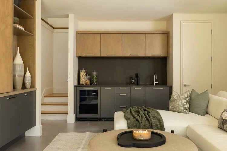 Lower living area of a custom home, interiors by Northside Interior Design (view 2).