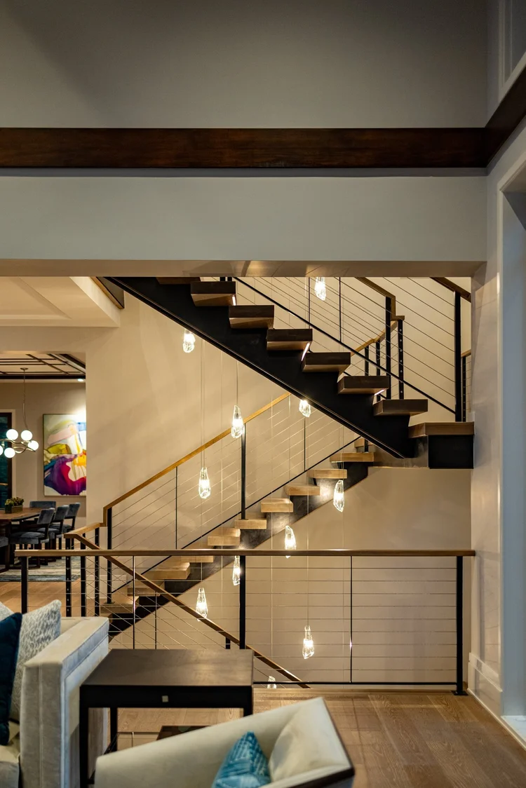 Stairwell of a custom home, built by Gabriel Builders.