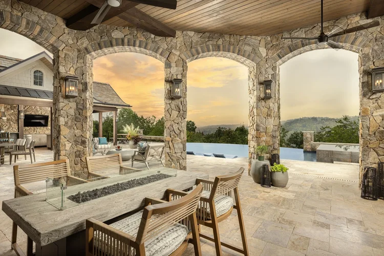 Poolside lounge of a custom home in Greenville, SC, interiors by Villa Verona Design.