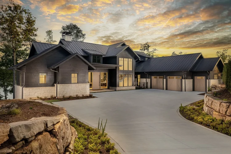 Twilight exterior of a custom home, built by Gabriel Builders (view 6).