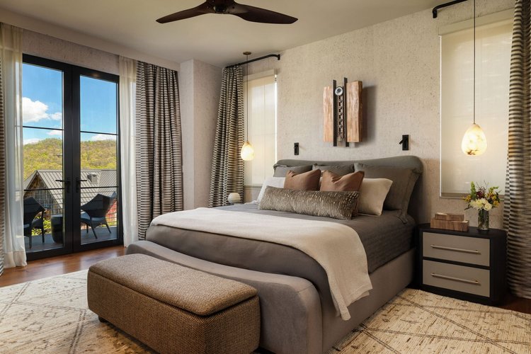 Primary bedroom of a custom home, interiors by Northside Interior Design (view 2).