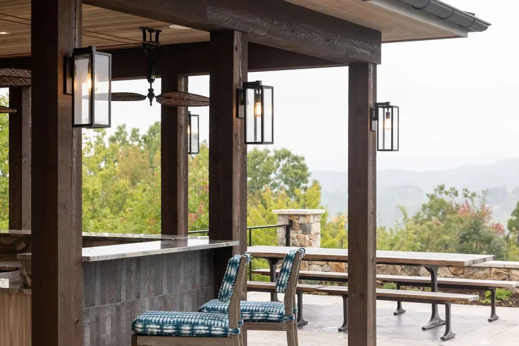 Outdoor bar area of a custom home in Greenville, SC, interiors by Villa Verona Design.