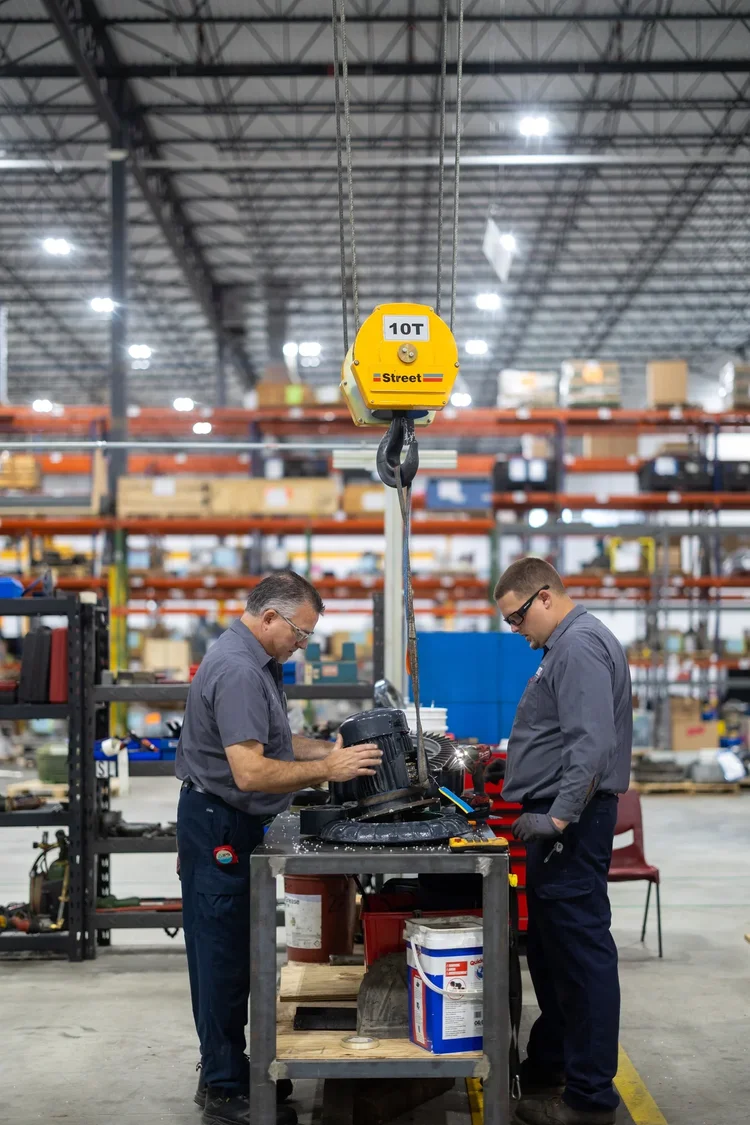 Interior of workers at the OTC industrial facility grand opening — industrial photography by Jack Robert.