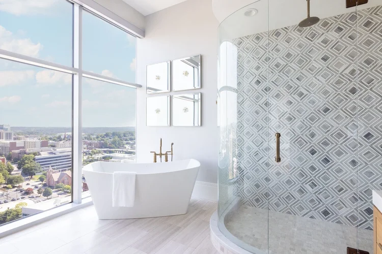 Primary bathroom of a modern Upstate penthouse in the Upstate of South Carolina (view 2).