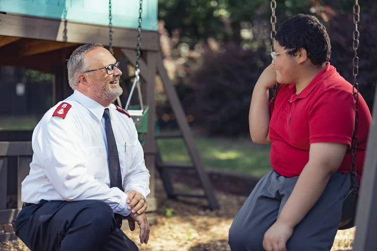 A man and a boy on a swing, documentary editorial story