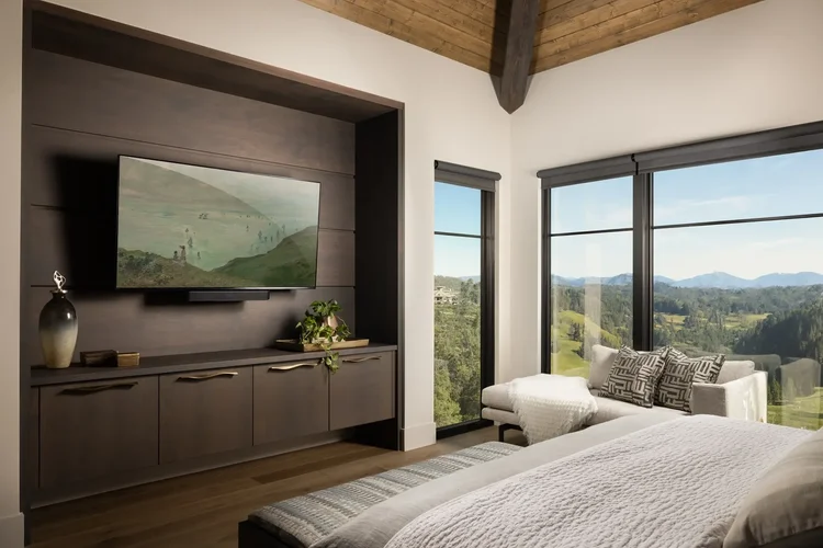 Bedroom with mountain views in a luxury custom home in Greenville, SC. Architectural photography by Jack Robert Connolly.