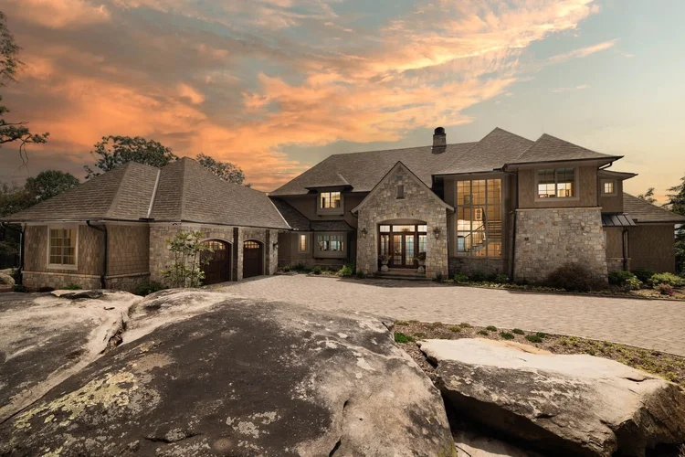 Twilight exterior of a custom home, built by Gabriel Builders.