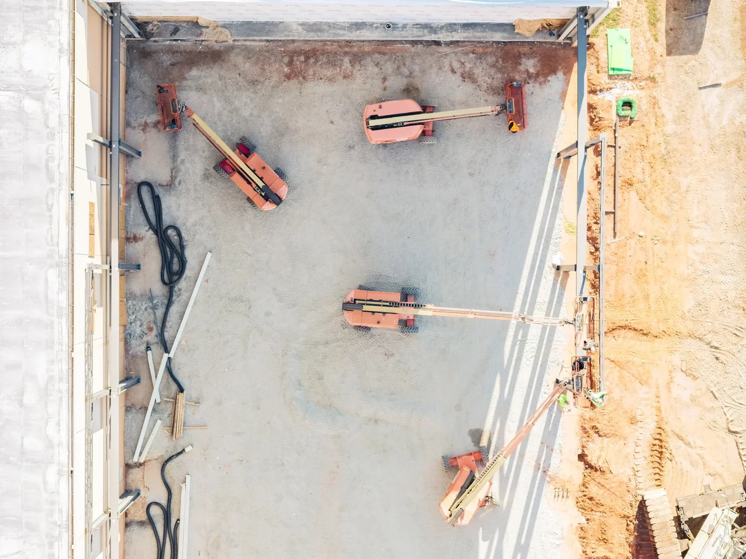 Aerial drone view of workers at the Trehel Corporation industrial facility — drone photography by Jack Robert Photo