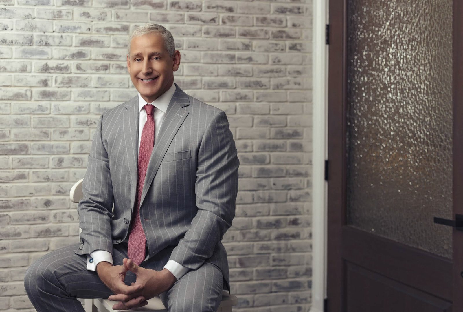 seated-male-executive-pinstripe-suit-headshot-jack-robert.jpg