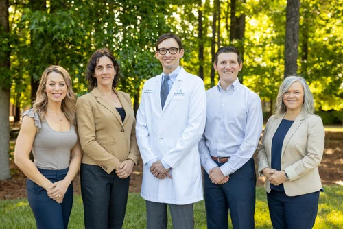 Chapel Hill Oral Surgery leadership team outdoor group photo