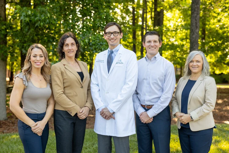 Chapel Hill Oral Surgery leadership team outdoor group photo