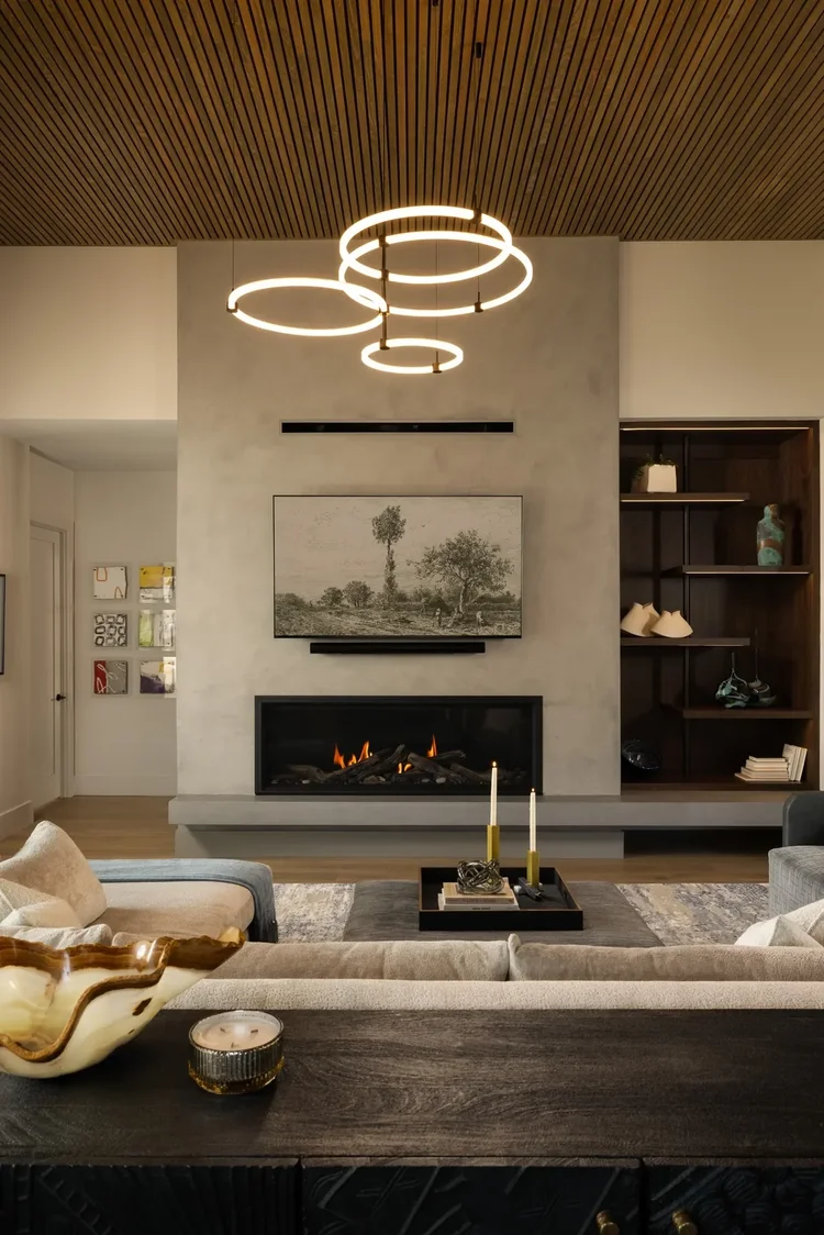 Living room with fireplace in a luxury custom home in Greenville, SC. Architectural photography by Jack Robert Connolly.