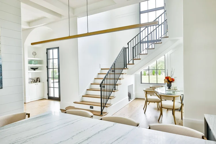 Dining room of a custom home in Greenville, SC, interiors by Calvin Wright Design.