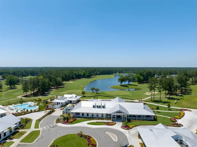 Aerial view of the clubhouse at Riverton Pointe Country Club, a Toll Brothers community — commercial architecture photography by Jack Robert.