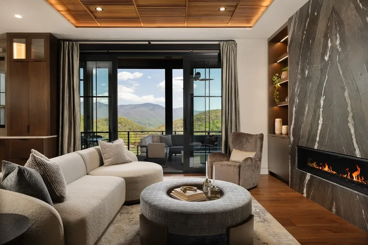 Living room with mountain views in a luxury custom home in Greenville, SC. Architectural photography by Jack Robert Connolly.