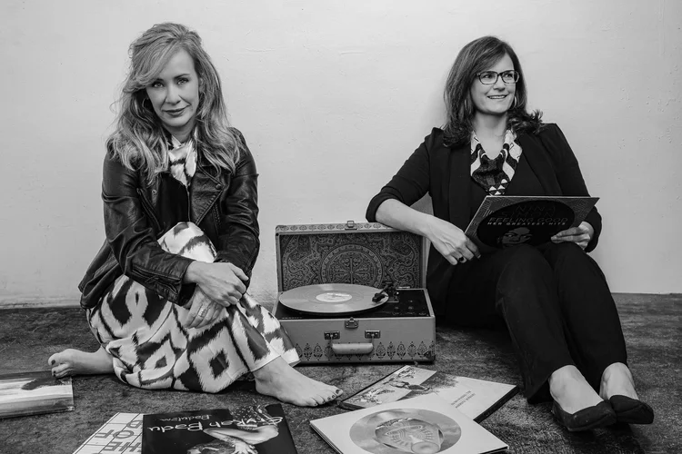Two women with vinyl records, editorial lifestyle feature for TOWN