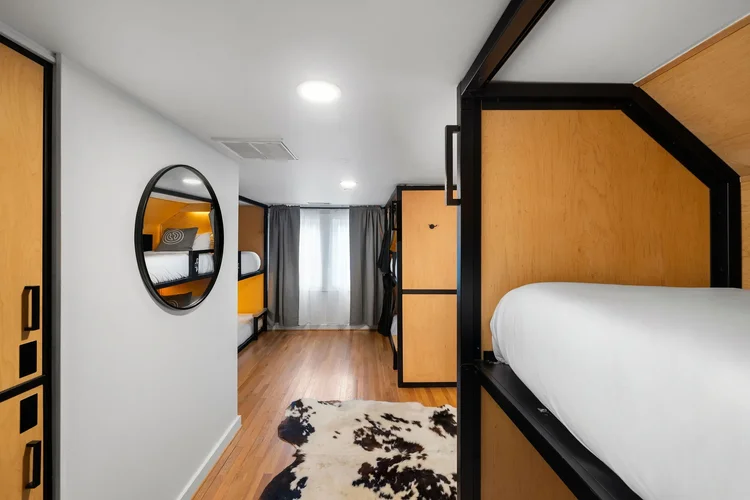 Interior of a bunk room in a commercial hospitality space — hospitality architecture photography by Jack Robert.