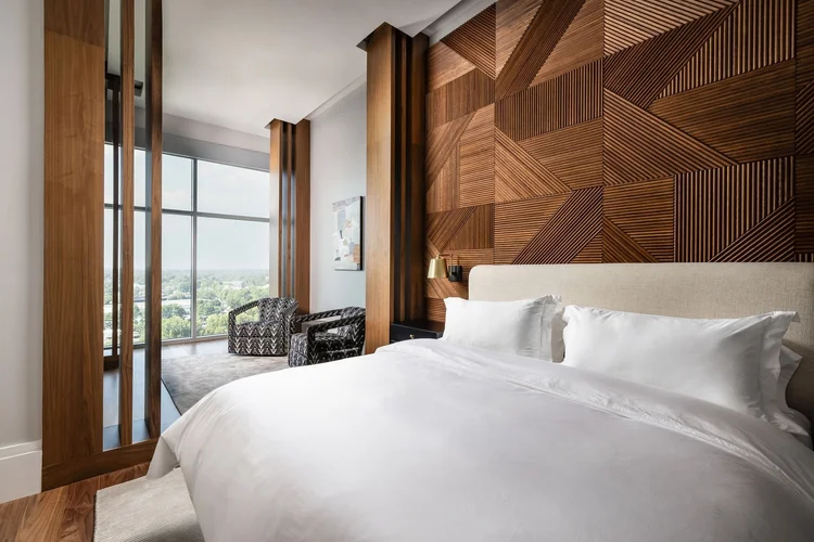 Guest room of a modern Upstate penthouse in the Upstate of South Carolina, featuring custom millwork.