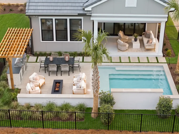 Aerial view of a custom home in Grande Dunes, Murrells Inlet, SC, built by Toll Brothers. Architectural photography by Jack Robert Connolly.
