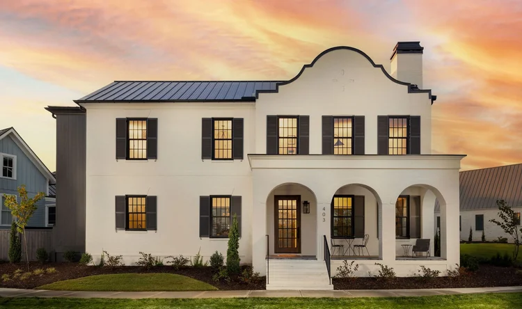 Twilight exterior of a custom home, built by Cottage Group.