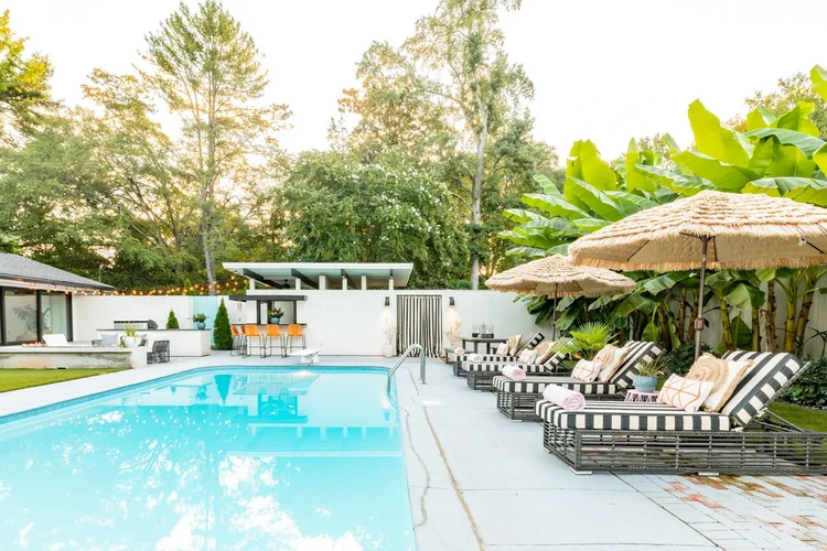 Pool of a mid-century modern custom home in Greenville, SC, interiors by Diggs Design (view 2).