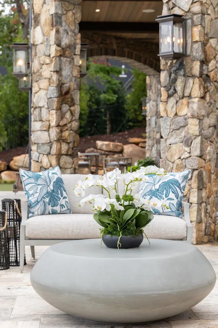 Outdoor lounge of a custom home in Greenville, SC, interiors by Villa Verona Design.