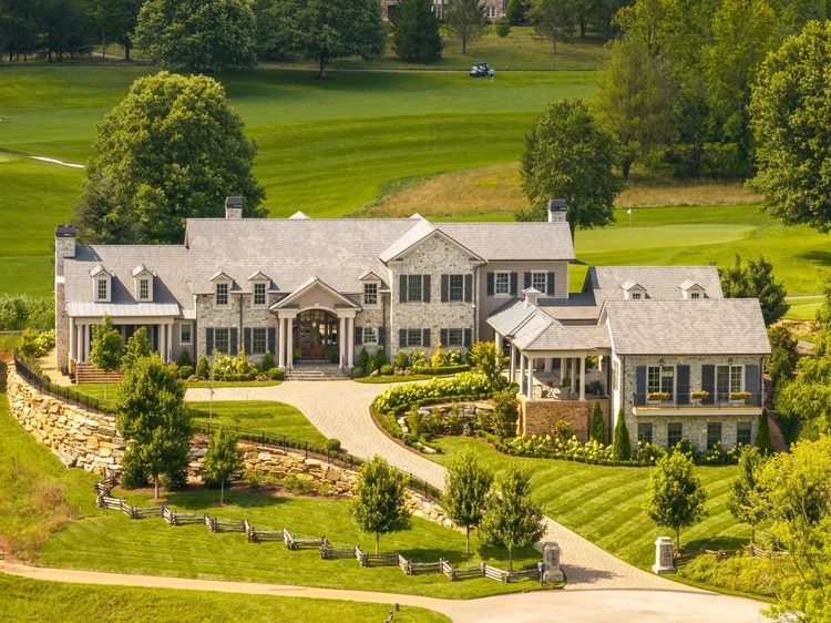 Aerial view of a custom home exterior (view 2).