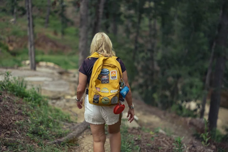 Hiker on a forest trail, editorial feature for Cliffs Living magazine