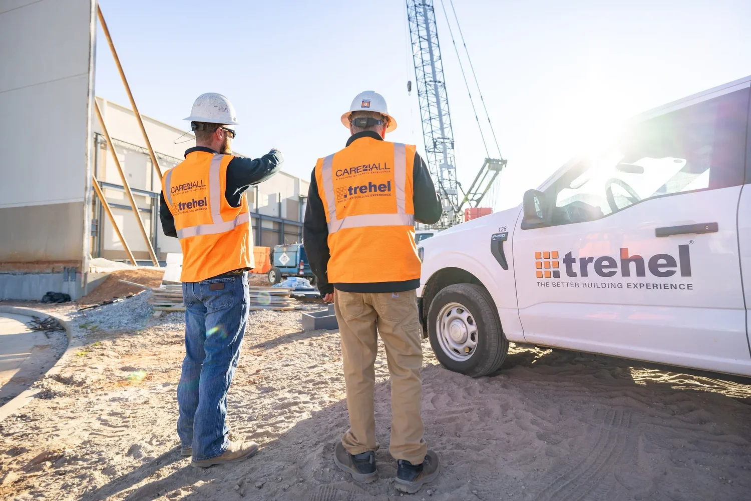 Workers inside the Trehel Corporation industrial facility — plant-floor photography