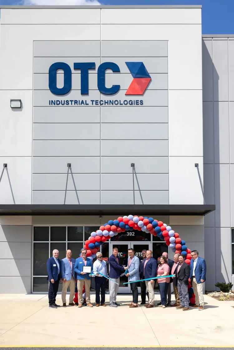 The OTC industrial facility ribbon-cutting — industrial photography by Jack Robert.