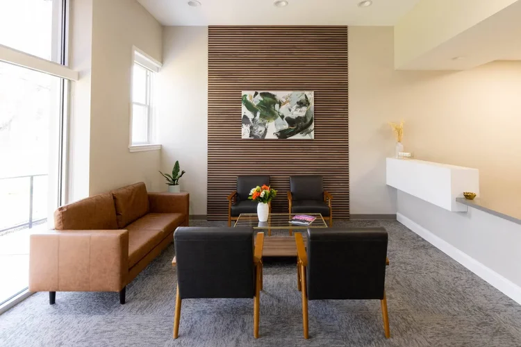 Interior of the waiting area of a modern dental office — healthcare architecture photography by Jack Robert.