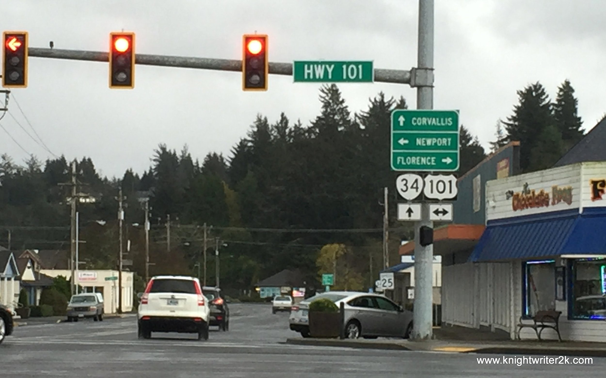 The intersection of US Route 34 and US Route 101 at Waldport. The Chocolate Frog is to the left. 