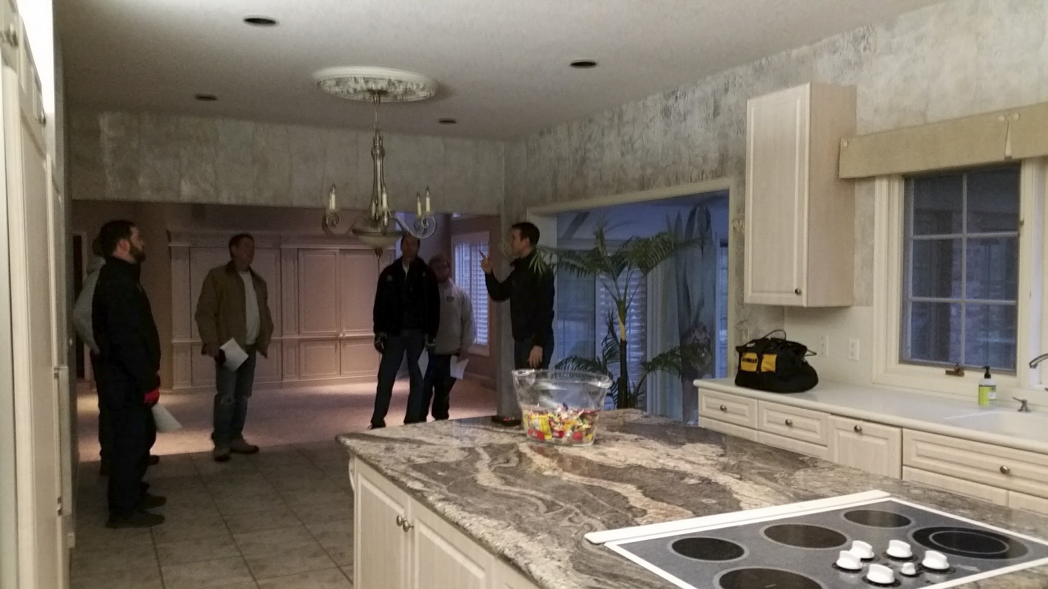 Kitchen before. Discussing demolition plan.