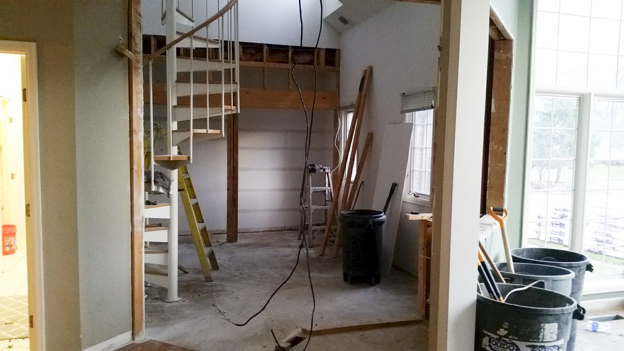 Existing, bonus space. Demoed and ready for transformation to laundry room. Garage entry on the left side of the frame will be the freshly designed mudroom.
