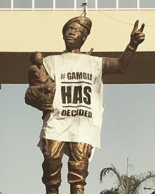 Social media played a pivotal role in ensuring that this guy, after 22 years of dictatorship and human rights abuses, is now former President Jammeh. This statue was a tribute to Jammeh, by Jammeh, adorned after his departure with the opposition slogan, and recently torn down from the Banjul city square.