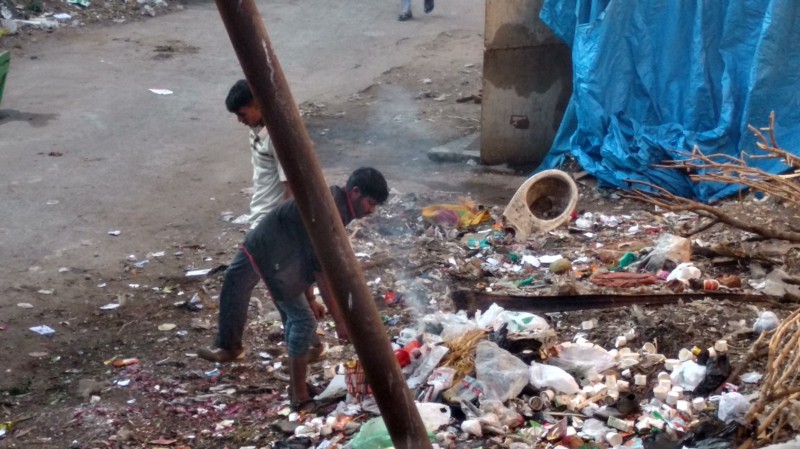 Sanitation workers are ill-protected against the hazardous waste in roadside dumps