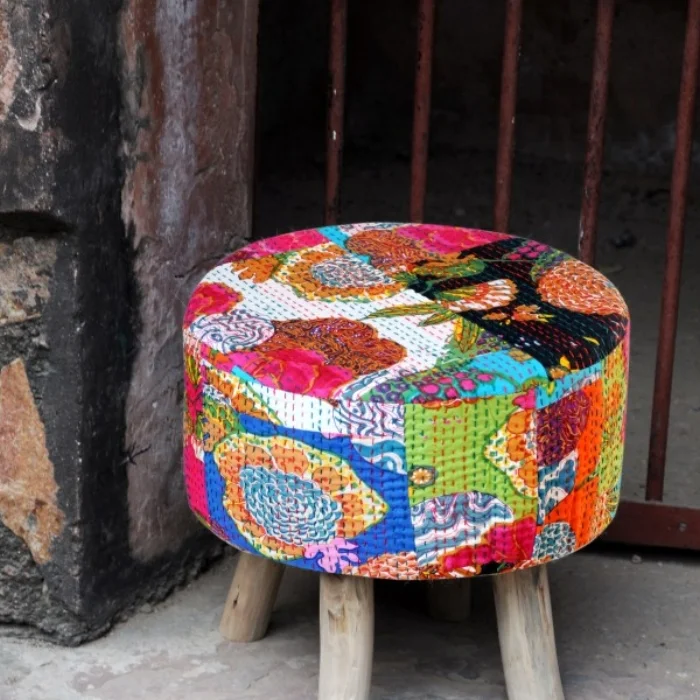 A stool made by upcycling carpets, rugs, mats and old wood furniture. Image: Rimagined