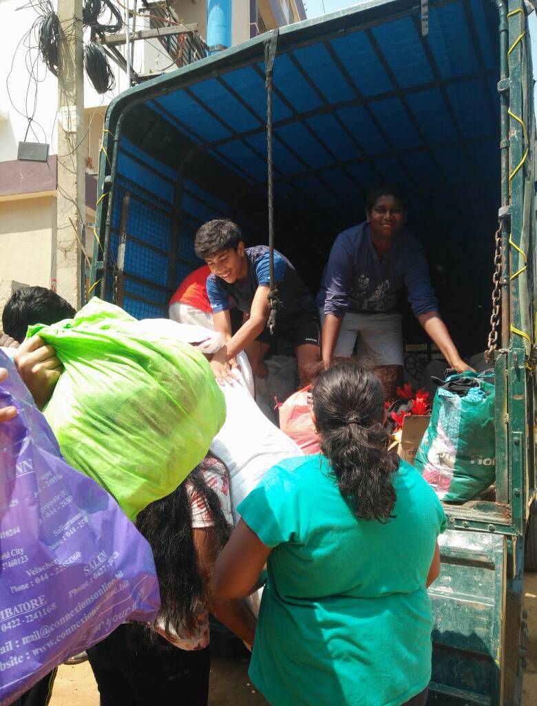 Loading the truck to Goonj