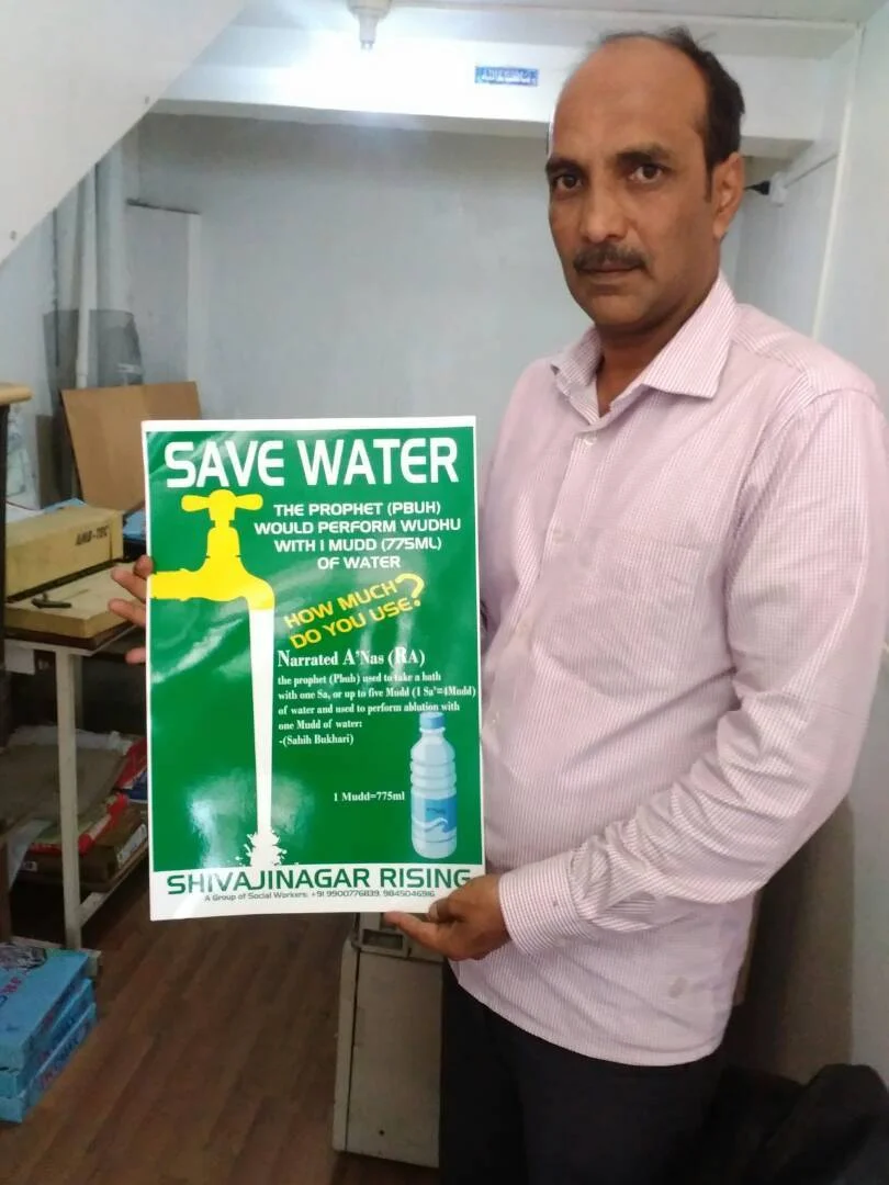 Sufiyan with the poster on water conservation