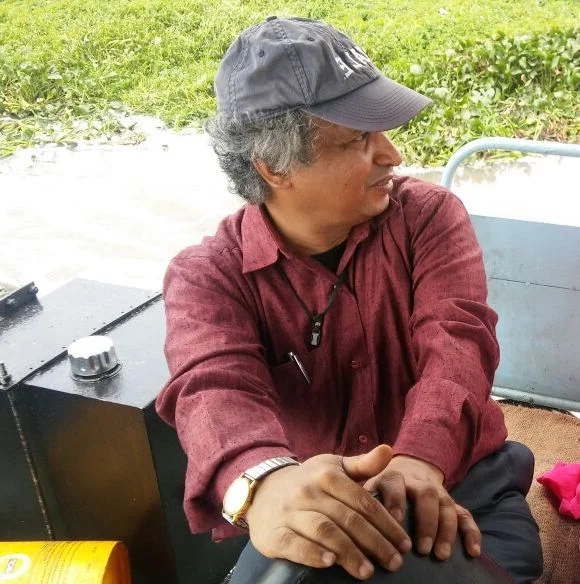 Prof Ramachandra inspects the lake