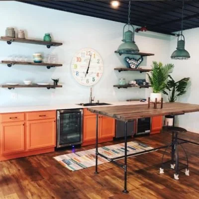 Counter-height kitchen island table with matching shelves