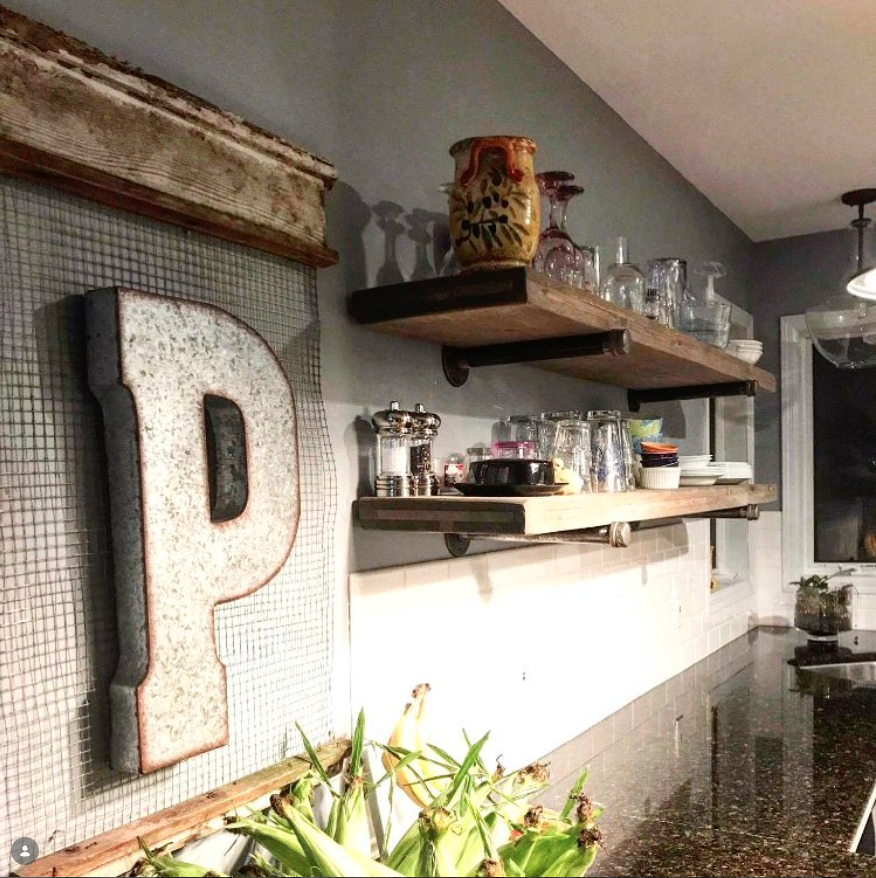 Shelves with pipe fixings.png