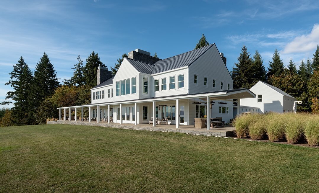 An existing farmhouse stood on the site of our Willamette Valley Residence; to begin our initial concept studies we took cues from its agrarian archetype. Our new design integrated the classic from, the quiet rhythms, and the welcoming covered porch 