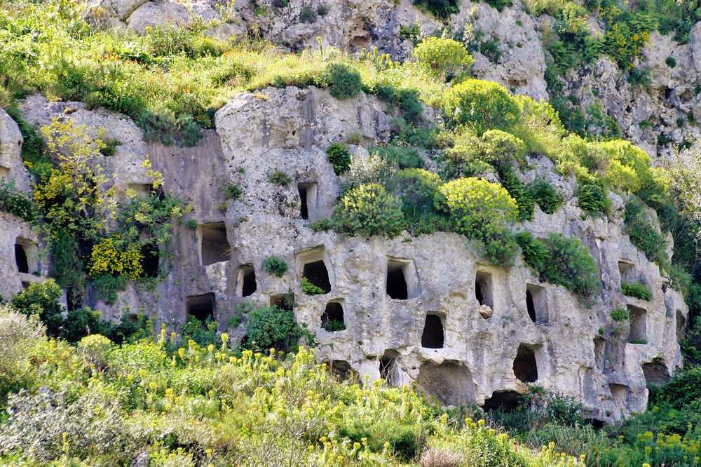 A typical Sicel necropolis. The dead were entombed within spaces carved into the rocky hillside.