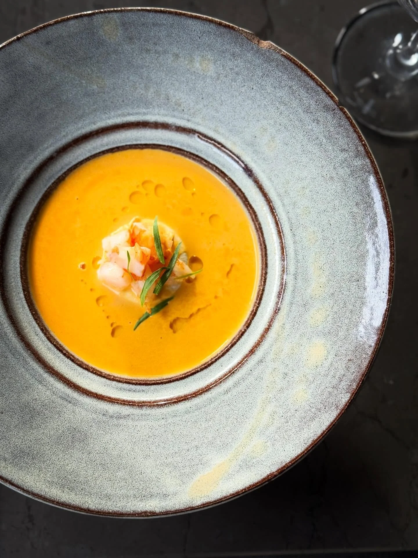 Warm up with our Shrimp Bisque, featuring tarragon and bergamot, a winter's night delight. 
#hotandhotfishclub #alseafood #shrimpbisque #michelinrecommended #bhamfood