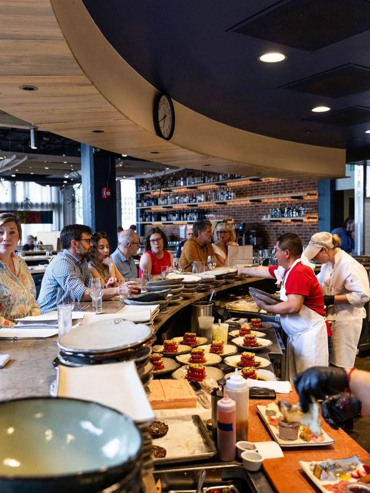 Chef Counter season is in full swing. 
A front-row seat to the kitchen, where every plate tells of summer in Alabama. Our iconic tomato salad is back&mdash;layered with peak-season tomatoes, prepared moments before it reaches the table, and served ju