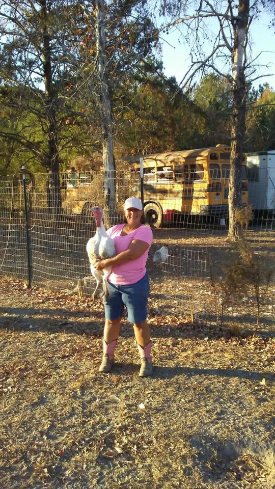 Michelle holding a turkey Morning Glory farms .jpg